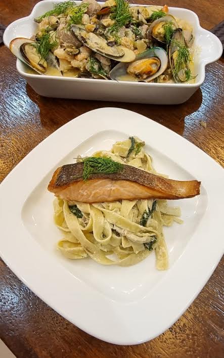 TAGLIATELLE  WITH SEAFOOD MEDLEY TOPPED WITH PAN-SEARED SALMON
